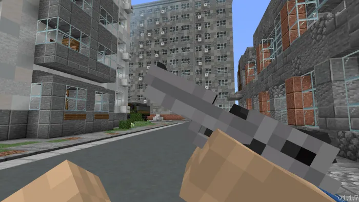 Pixelated handgun held on urban street scene