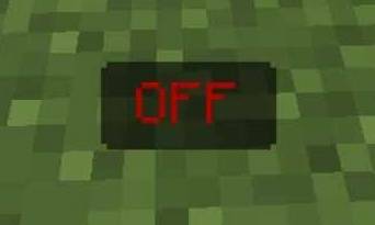 Red OFF button on grass block.