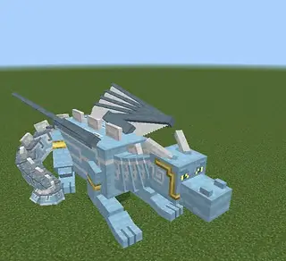 Blue blocky dragon resting on grass.