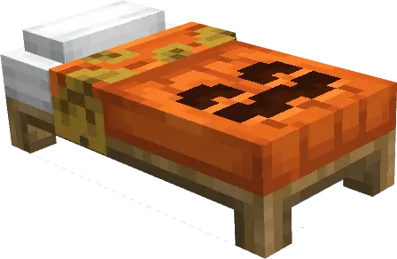 Bed with a jack-o-lantern themed blanket