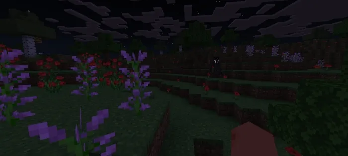 Dark figure with glowing eyes in a flower field