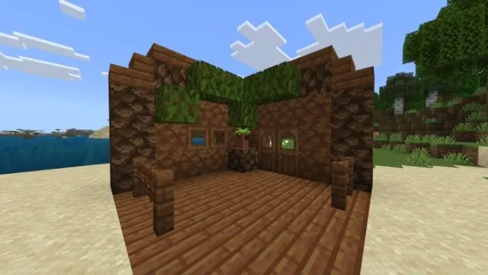 Wooden hut with new blocks and foliage