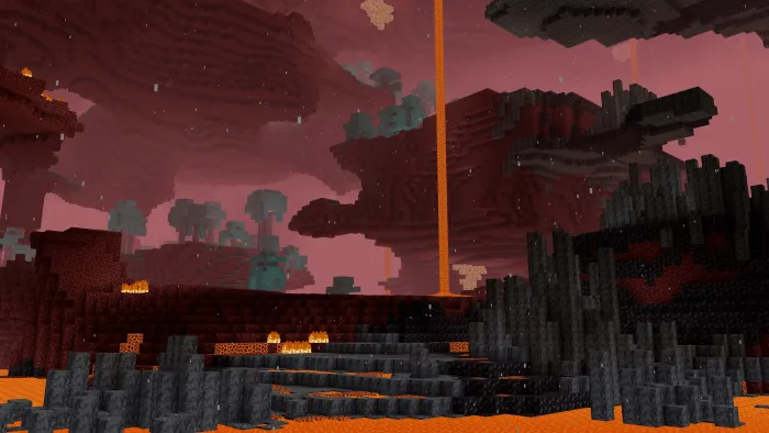 Dense red fog in a volcanic cavern landscape