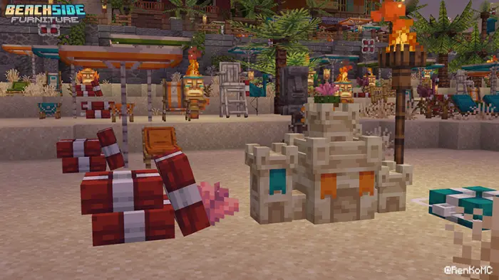 Beach-themed blocks and decor on sand