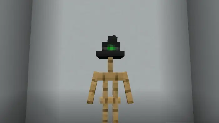 Armor stand with a black witch hat