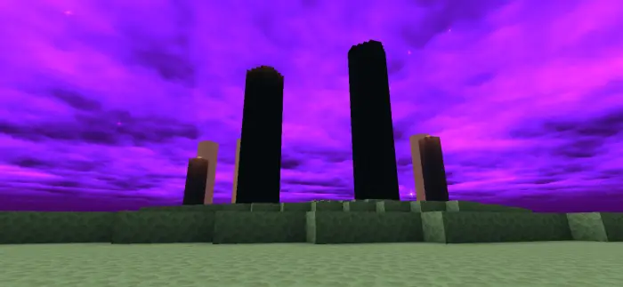Dark pillars under vibrant purple sky