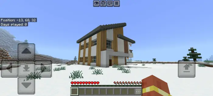 Two-story house in snowy landscape