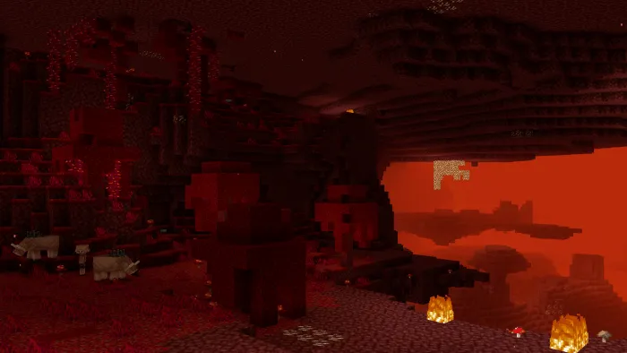 Dense red fog fills a cavernous landscape.