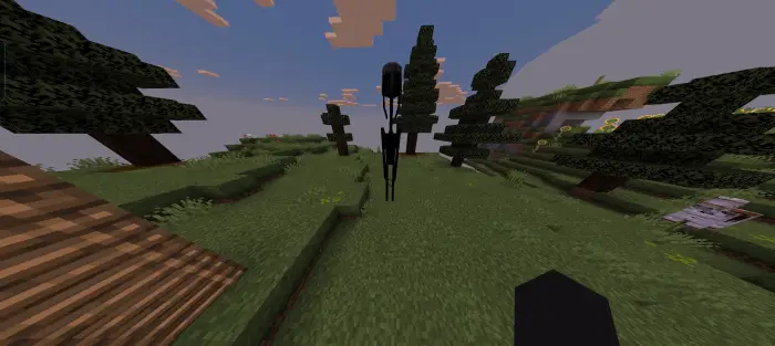 Tall shadowy creature haunting grassy hills