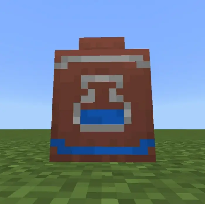 Colorful pixelated decorative pot on grass