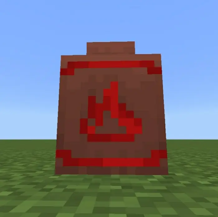 Red decorative pot with pixel art flame