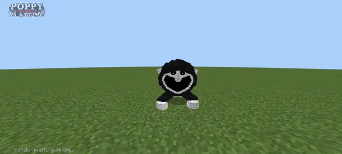 Round black creature with a white smile.