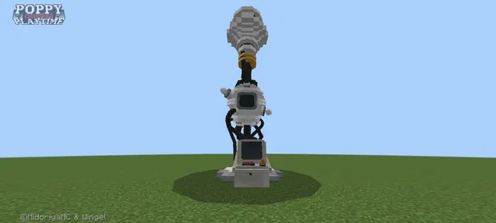 Blocky mechanical device on green grass