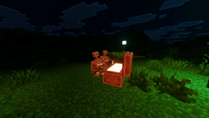 Copper golem with glowing shelf at night