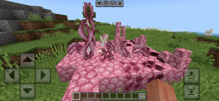 Pink grotesque creature with twisted tentacles