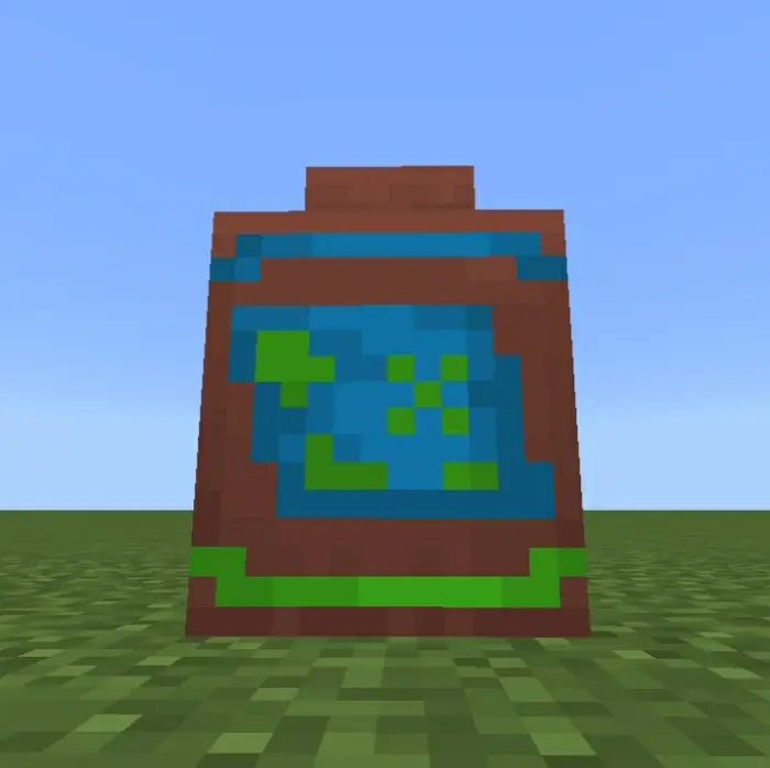 Colorful pixelated decorative pot on grass.