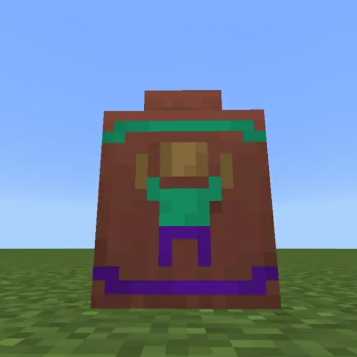Colorful pixel art decorative pot on grass.