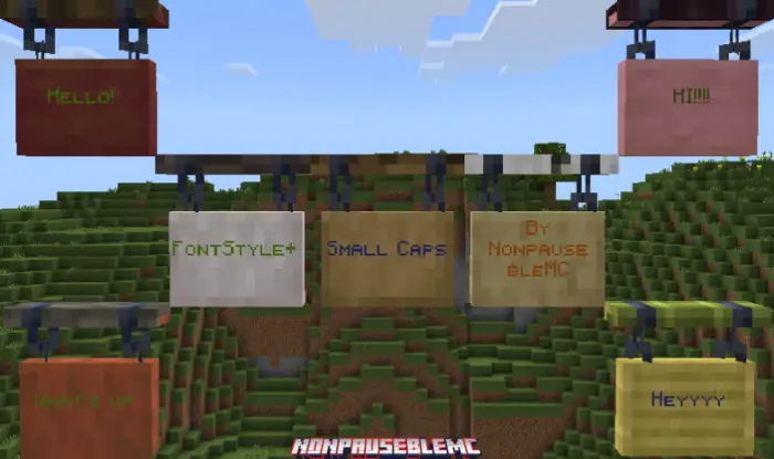Custom font signs displayed on a hillside