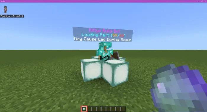 Bot loading build on grassy field