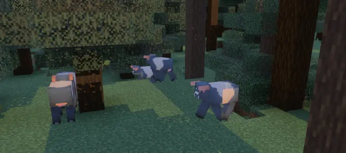 Blocky cow variants grazing in a forest