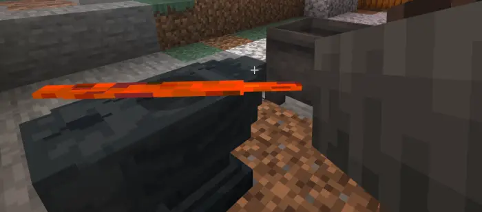 Heated ingot on anvil ready for forging
