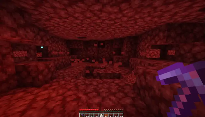 ALT Mining red blocks with a glowing pickaxe
