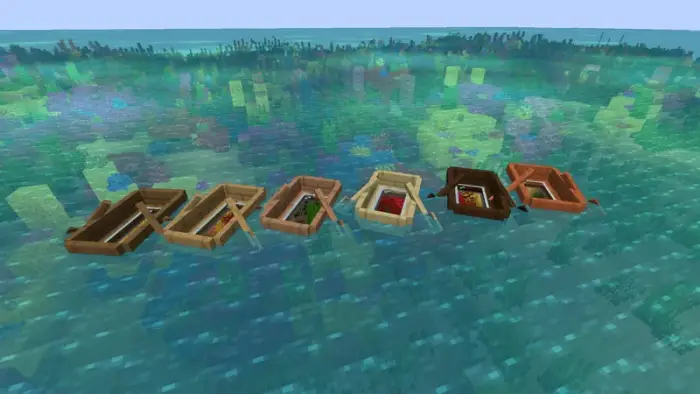 Glass-bottom boats floating on clear water