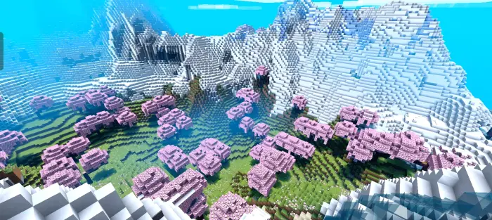 Cherry blossom valley surrounded by snow peaks