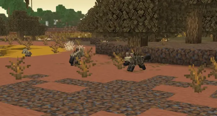 Three stylized wolves in a savanna biome