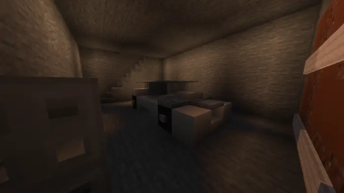 Dimly lit basement with stone walls and stairs