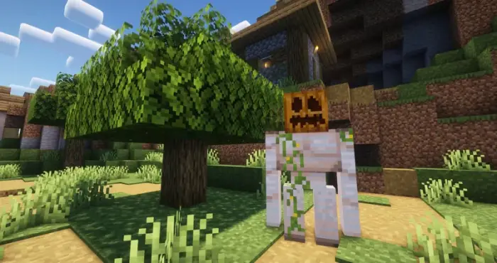 Iron golem with a carved pumpkin head