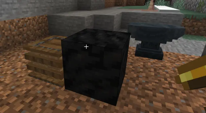 Charcoal block and anvil near forge setup