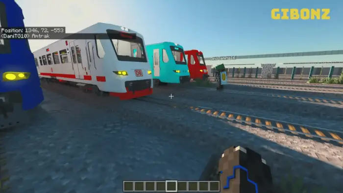 Three colorful trains on railway tracks