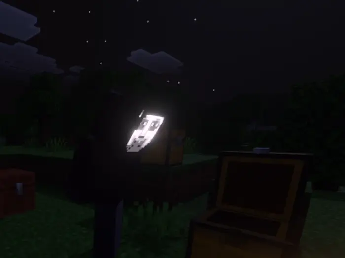 Glowing masked figure near open chest at night