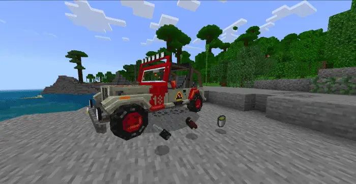 Red and white jeep near a jungle biome