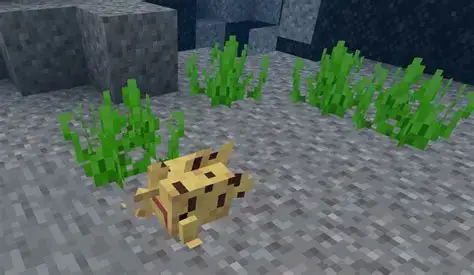 Blocky yellow fish near underwater plants