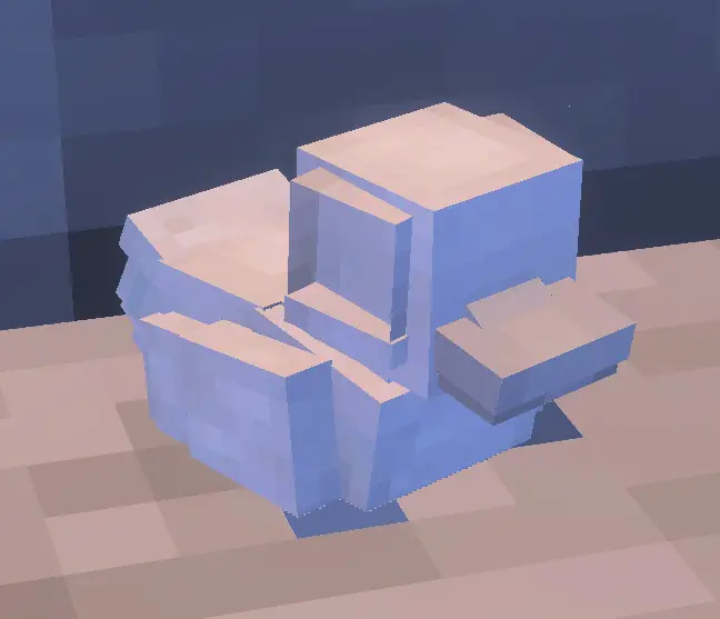 Blocky rubber duck sits underwater.