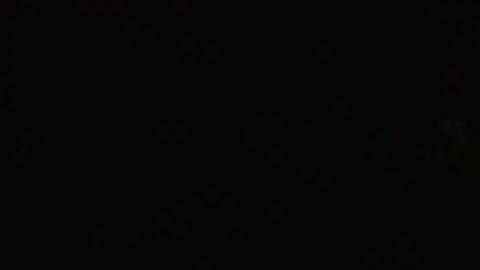 Image is too dark to discern content.