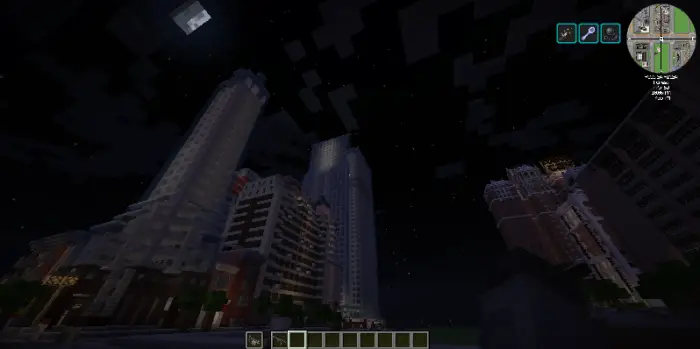 Blocky city skyscrapers under a night sky