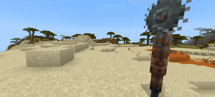 Spiked weapon held in a desert biome