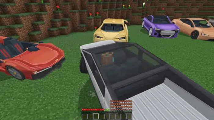 Blocky supercars parked on grassy terrain