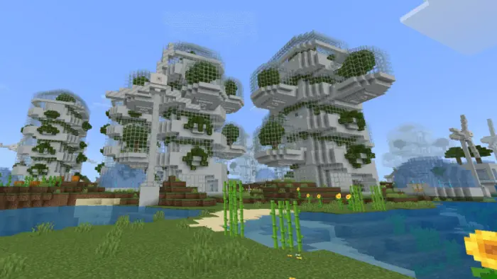 Futuristic white towers with greenery