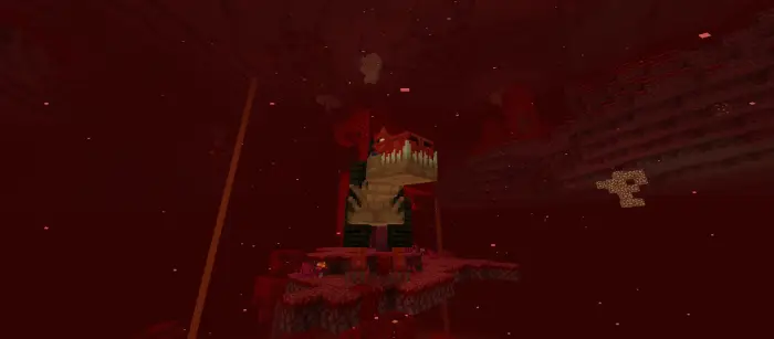 Large red dinosaur mob in a dark cave.