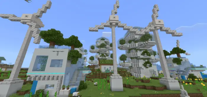 Futuristic white buildings with wind turbines