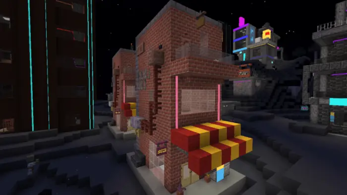 Brick building with neon lights at night