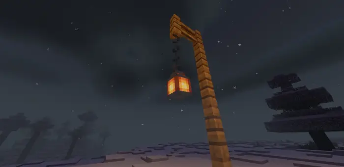 Wooden lantern post with soft night lighting
