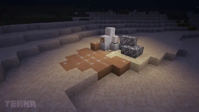 Assorted new blocks arranged on sandy terrain
