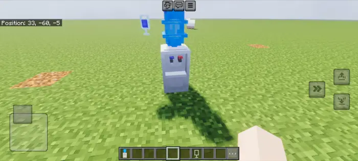Water dispenser mod object on grassy field