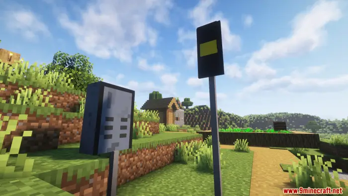 Two custom road signs on a grassy path