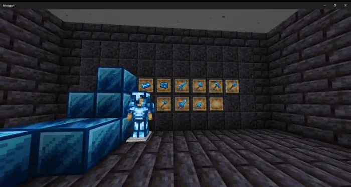 Blue armor, tools, and ores in a stone room